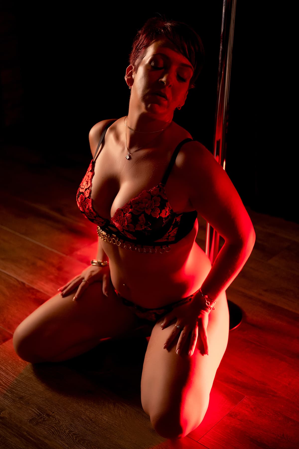 Neon glow boudoir portrait