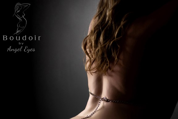 woman in wearing delicate gold jewelry